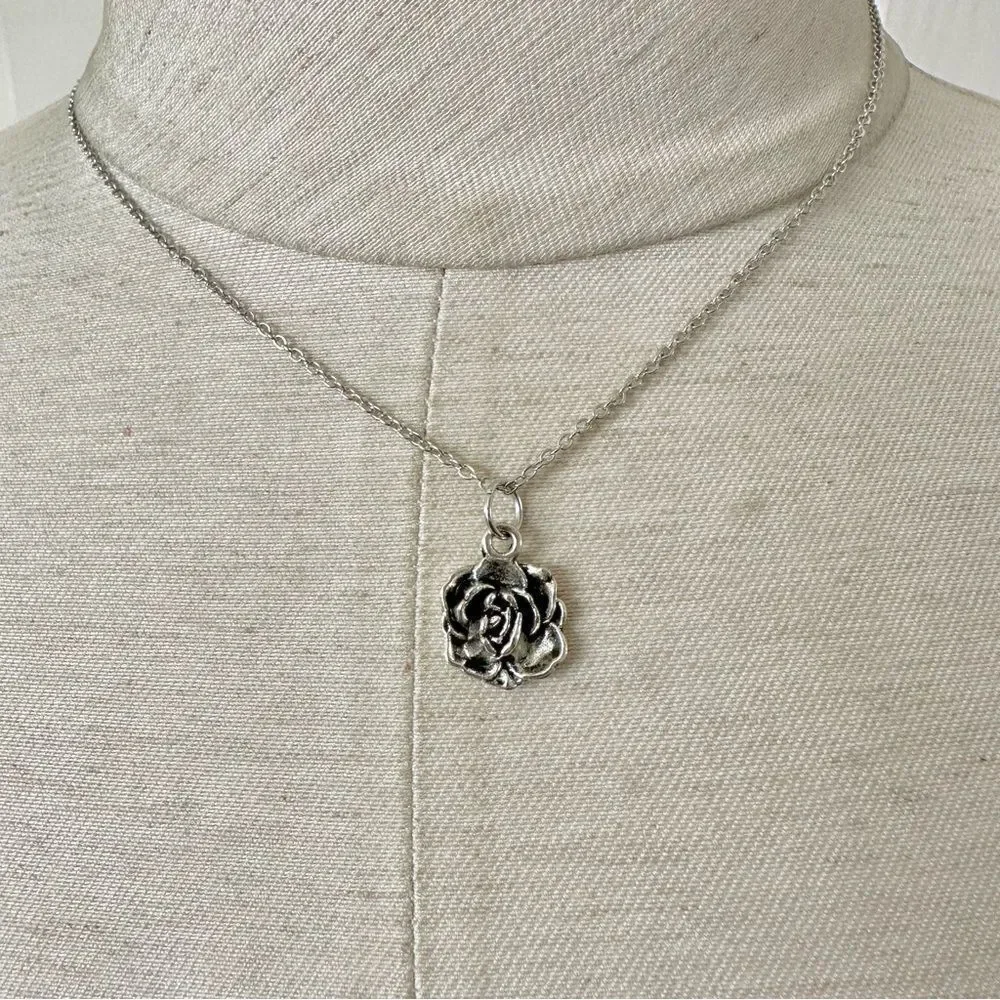 Silver tone rose pendant necklace